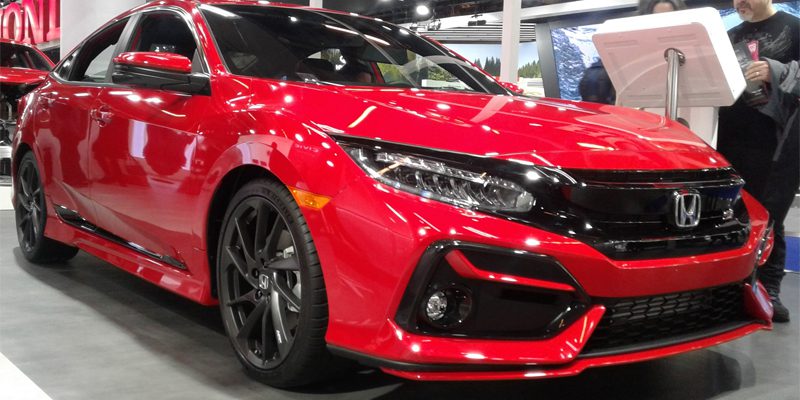Close-up view of a Honda Civic, showcasing the car's sleek exterior design and modern features.