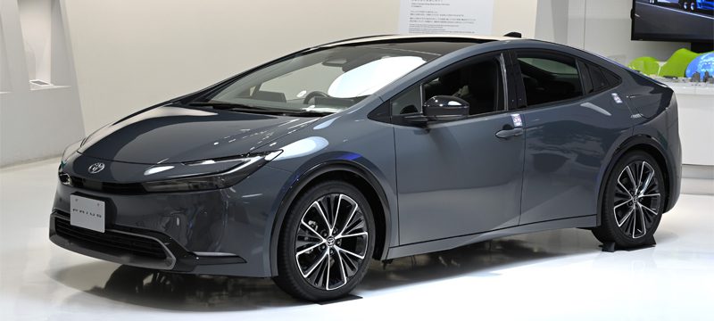 Close-up view of the Toyota Prius Z HEV, showcasing its aerodynamic design and hybrid features.
