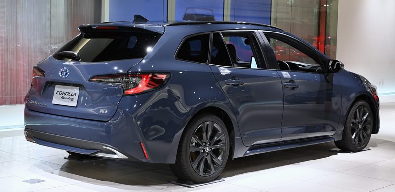 Close-up view of the Toyota Corolla Touring Hybrid, showcasing its stylish exterior and efficient hybrid features.