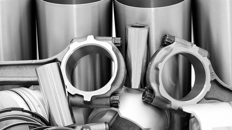 Close-up of OEM connecting rods showing original equipment quality and precision engineering.