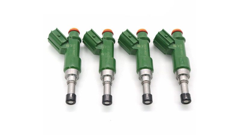 High-performance fuel injectors arranged in rows for inspection.