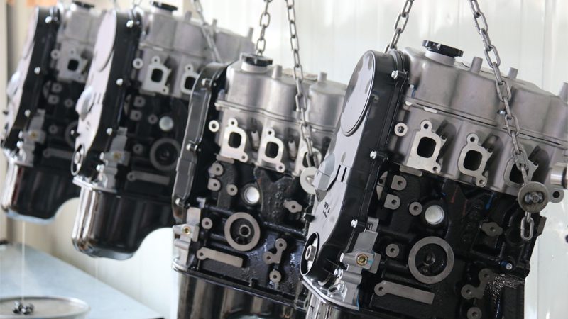 Newly assembled engine showcased at Nanjing Woda Auto Technology's factory production line.