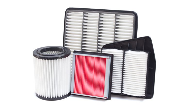 Close-up view of automotive air filters showing pleated filter material used to trap dust and debris.