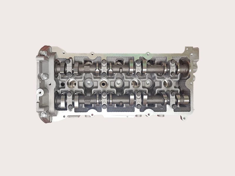 Close-up of Nissan QR25 4-cylinder, 16-valve cylinder head, showing camshaft assembly