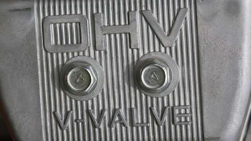 Close-up of an Overhead Valve (OHV) engine, showing pushrods and compact cylinder block design.