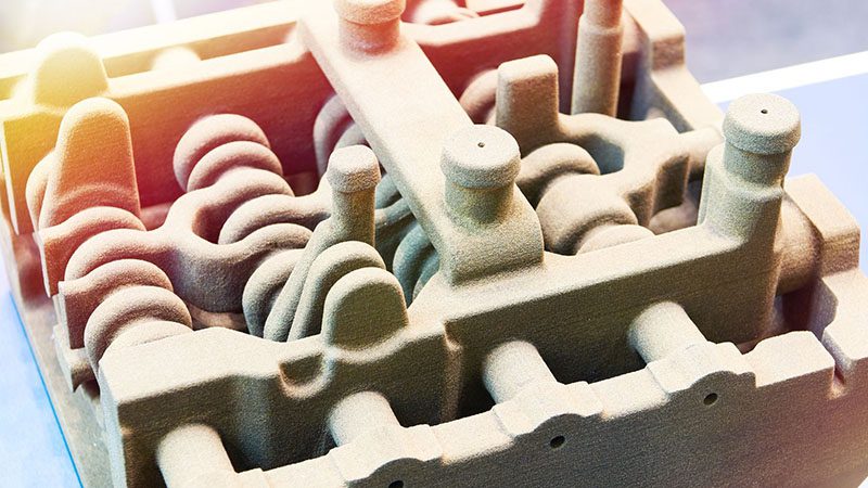 Molds used for casting a cylinder block in engine manufacturing process.