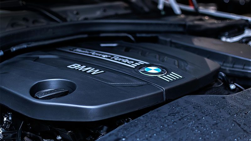 Close-up view of automotive engine housings, showcasing precision engineering and durable metal construction.