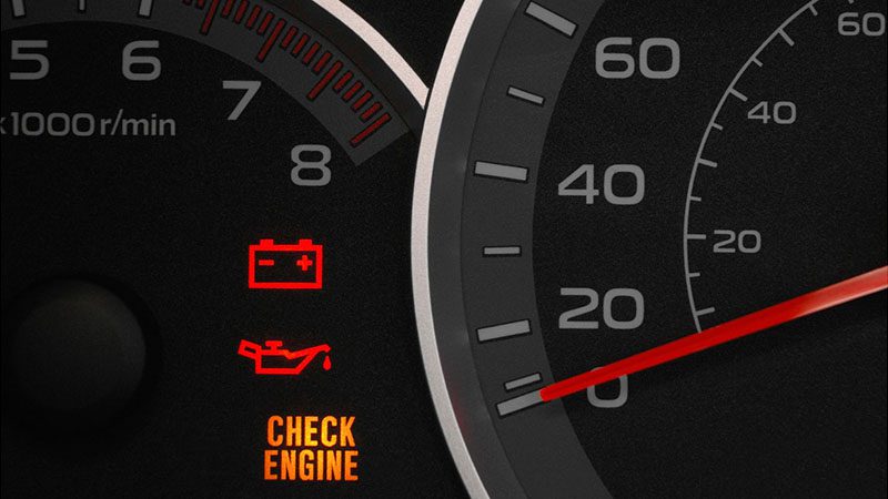 Check engine warning light illuminated on dashboard, indicating potential engine fault or reduced power condition.