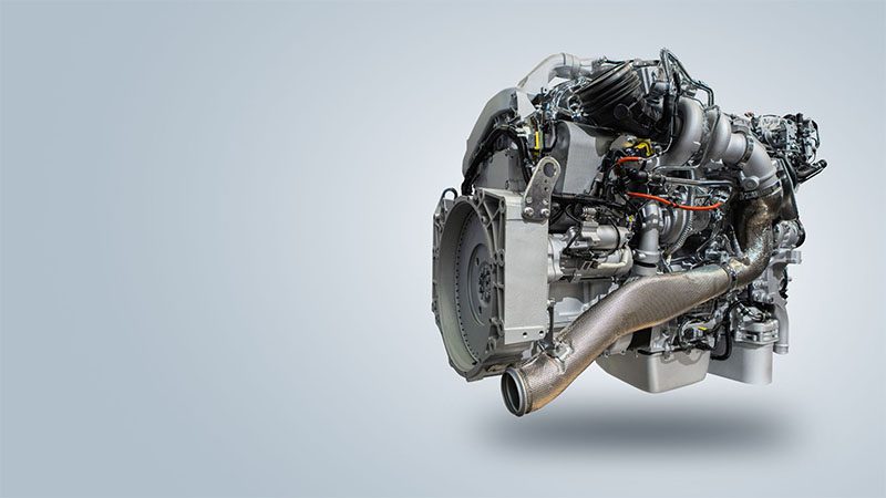 Display of a new automotive engine, highlighting modern engine design and specifications.
