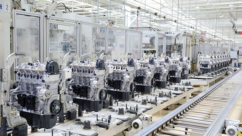 Engine production line at Nanjing Woda Auto Technology Co., Ltd., highlighting advanced manufacturing of automotive engine components.