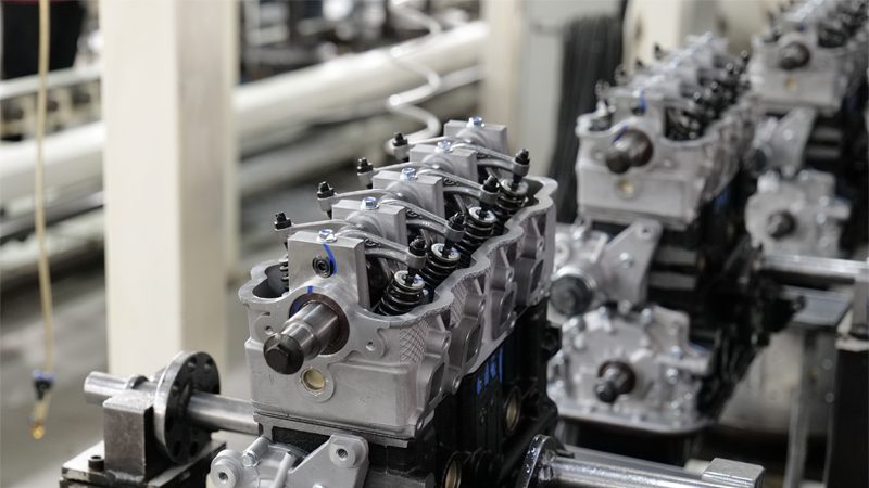 Close-up of an engine being assembled at the Nanjing Woda Auto Technology Co., Ltd. factory production line