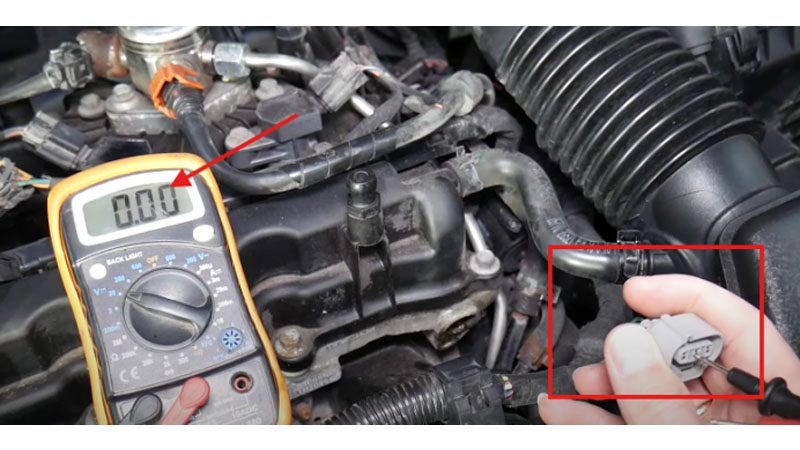 Identifying the camshaft position sensor ground wire.