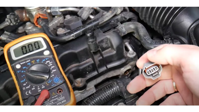 Setting the voltmeter to 20 DC volts.