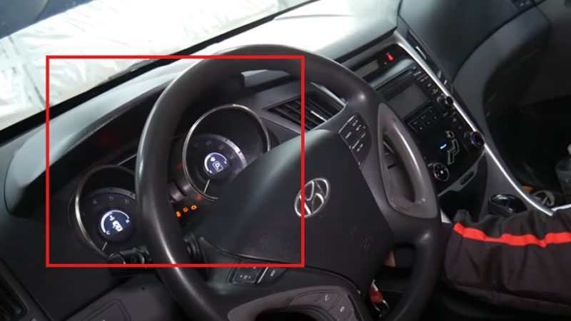 Turning the car ignition to ON.