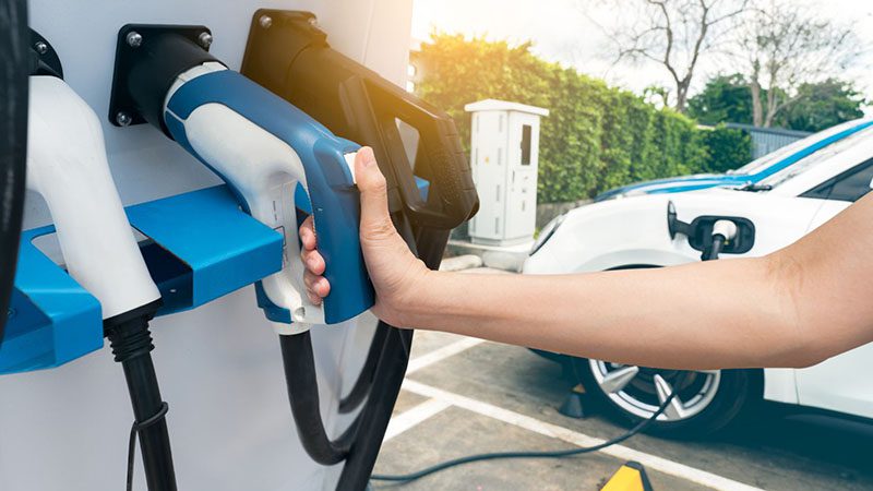 Charging connectors for hybrid vehicles at a charging station.