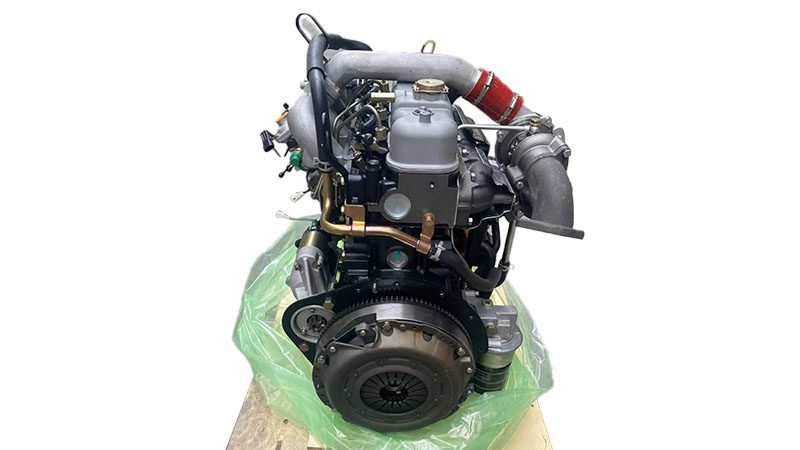 Other side view of an Isuzu 4JB1-T turbo diesel engine, highlighting fuel injection components and engine block structure.