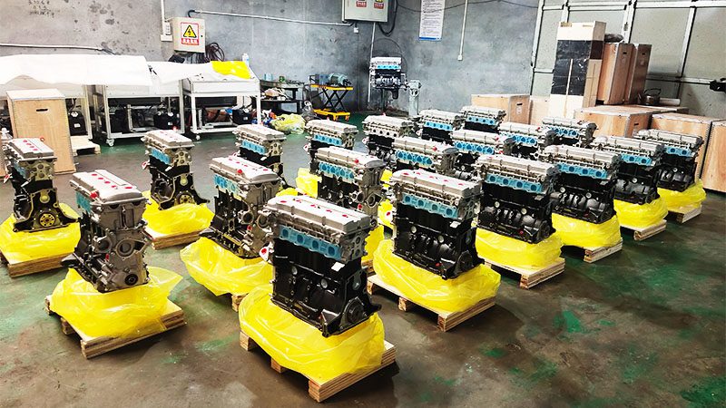 Multiple KA24 engines on display at our company's factory, showcasing a range of high-quality engine components and models.