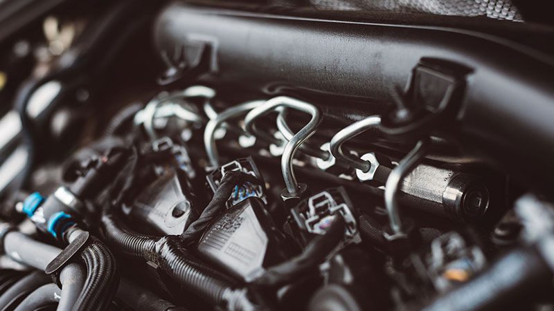 Close-up of a modern turbocharged diesel engine showcasing detailed components and engineering design.