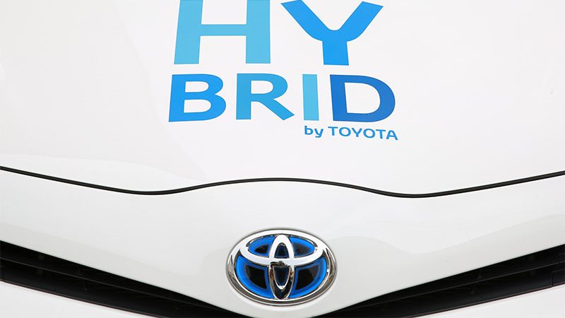 Hybrid written on a Toyota hood.