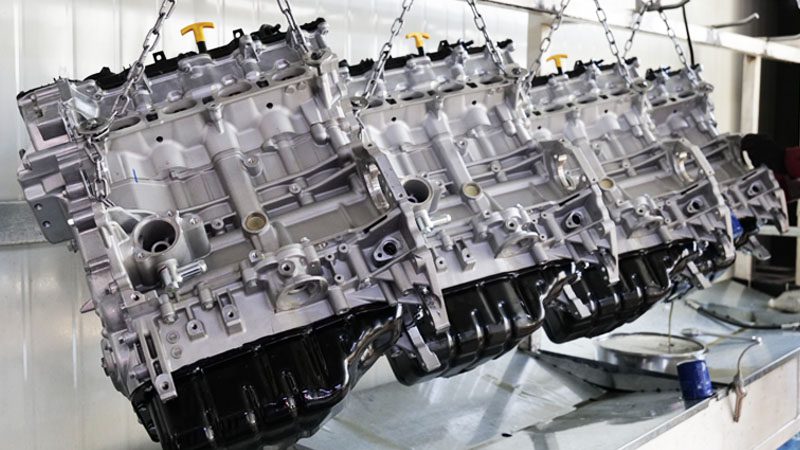 Assembled automotive engines on display at our company’s factory production line.