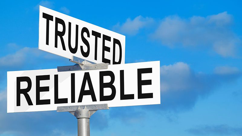 Street sign with the words "Trusted" and "Reliable," symbolizing engine dependability and long-term performance.