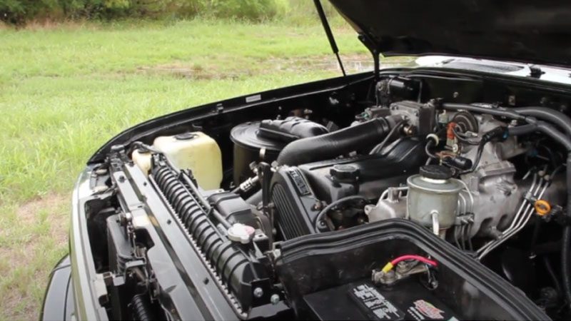 Close up of Toyota 1HD-FTE turbo diesel engine under the hood.