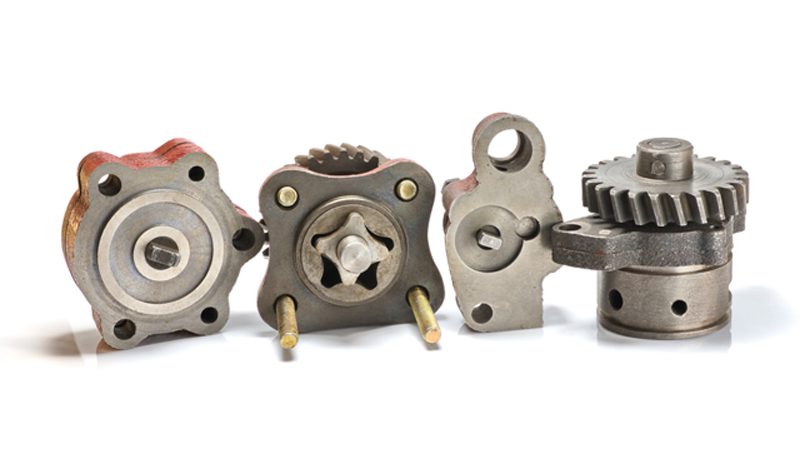Close-up of various types of engine oil pumps