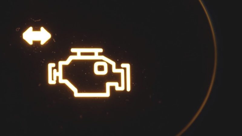 Check engine light illuminated on dashboard, indicating possible P0016 code malfunction.