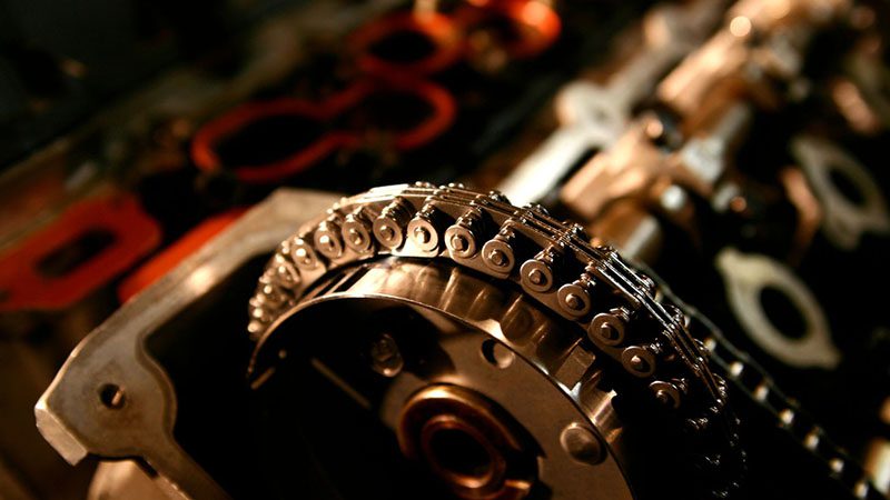 Close-up view of an engine timing chain.
