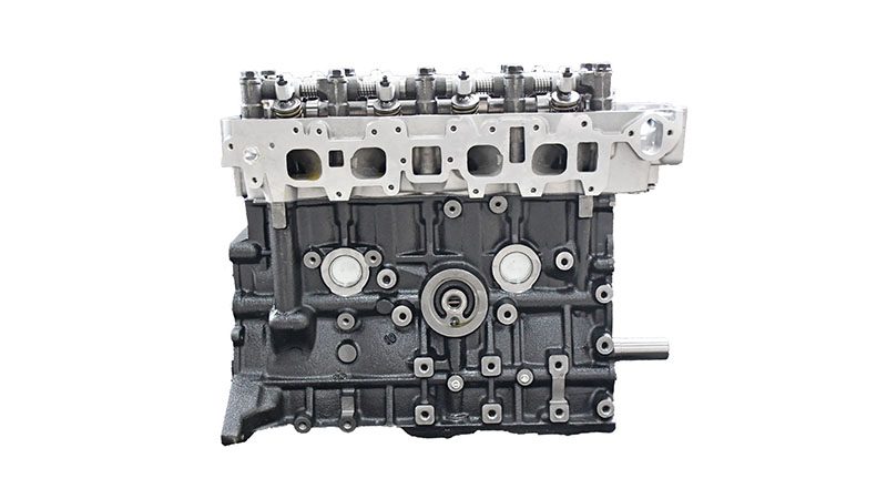 Front view of a Toyota 22R bare engine showcasing block, cylinder head, and accessory mounts.