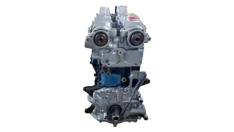 Side view of a bare Toyota 2JZ engine showing the cylinder head, block, and mounting points.