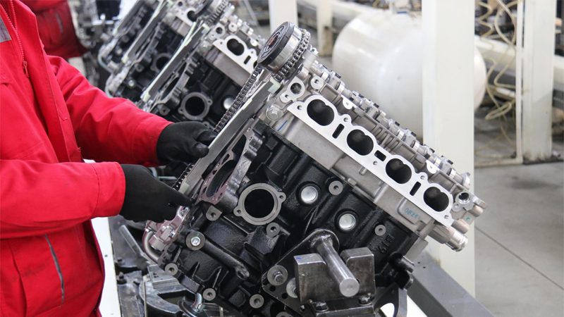 Auto engine production line at Nanjing Woda Auto Technology Co., Ltd factory, showcasing assembly process