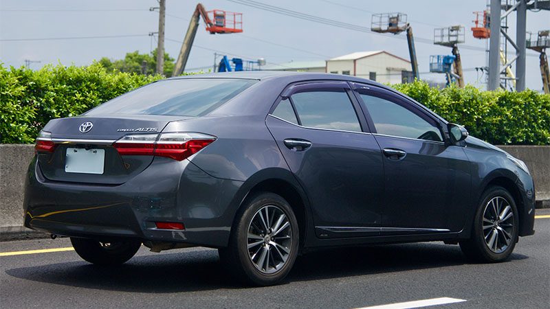 Close-up view of the Toyota Corolla Altis, showcasing its stylish exterior and refined design features.