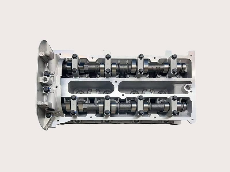 Cylinder head product at Nanjing Woda Auto Technology Co., Ltd., showcasing high-quality engineering for automotive engines.