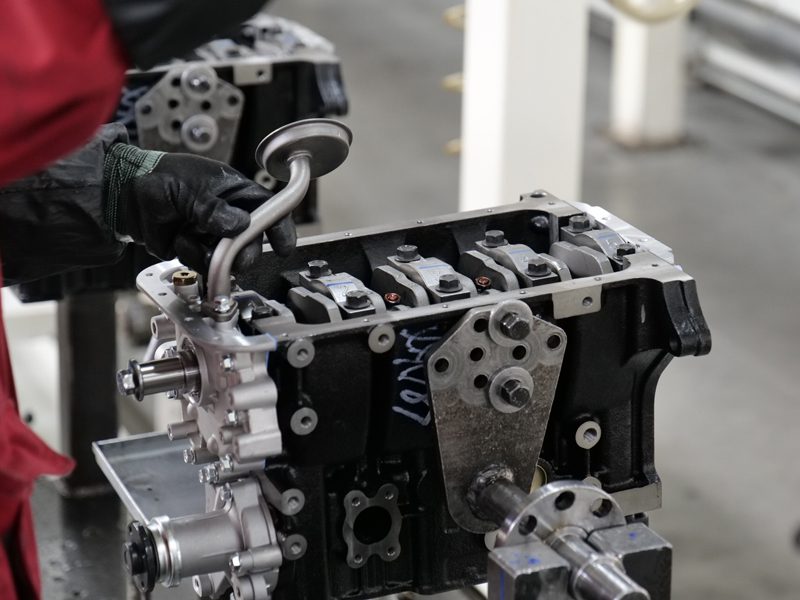 Auto engine factory production line at Nanjing Woda Auto Technology Co., Ltd., featuring the engine assembly process for high-quality automotive engines.