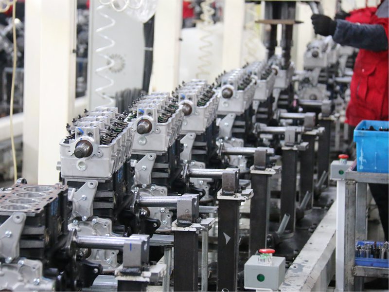 Auto engine production line at Nanjing Woda Auto Technology Co., Ltd., showcasing advanced manufacturing processes for high-quality OEM and aftermarket engine parts.