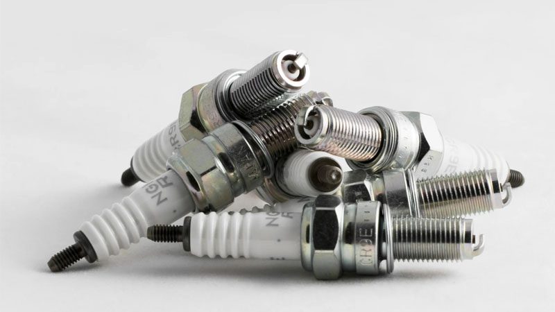 Close-up of high-performance spark plugs for automotive engines.