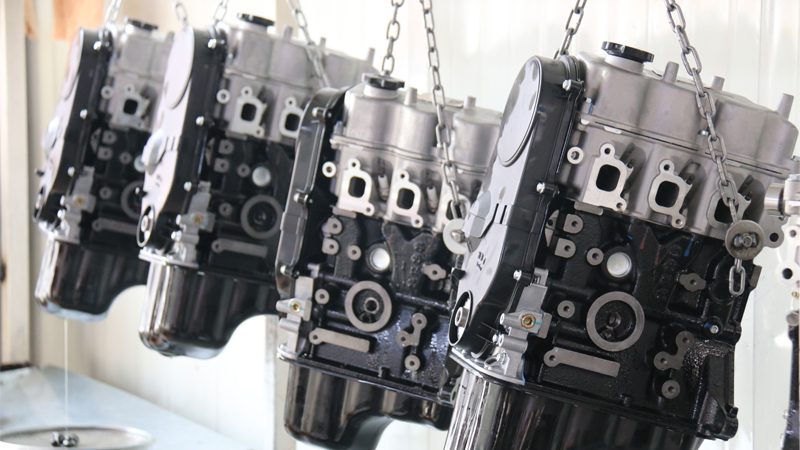 Close-up of newly assembled car engines on the production line at Nanjing Woda Auto Technology Co., Ltd.