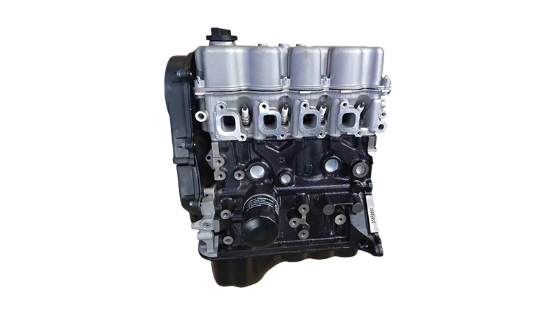 Вид спереди на двигатель Chevrolet Aveo B12S1 в сборе.