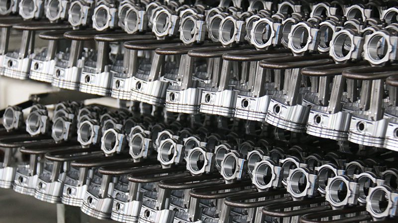 High-quality engine parts displayed at Nanjing Woda Auto Technology Co., Ltd.'s factory.
