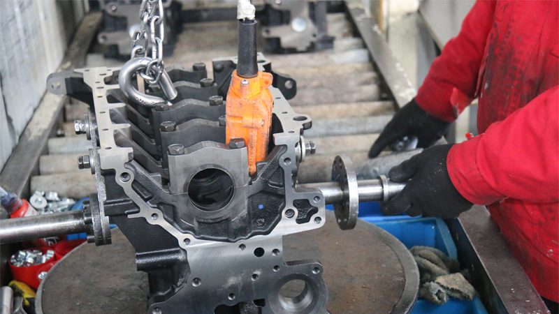 Engine parts manufacturing process in Nanjing Woda Auto Technology Co., Ltd.'s factory.