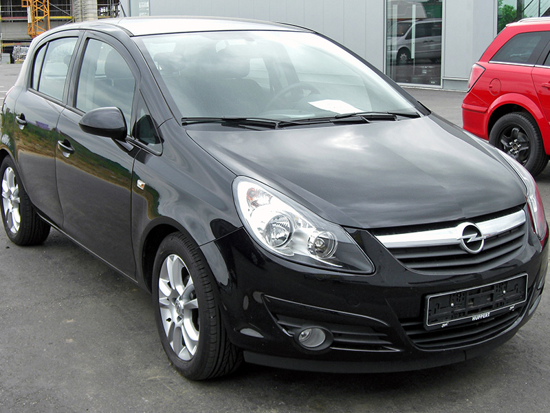 Opel Corsa D 1.2 front view showing engine model generation.