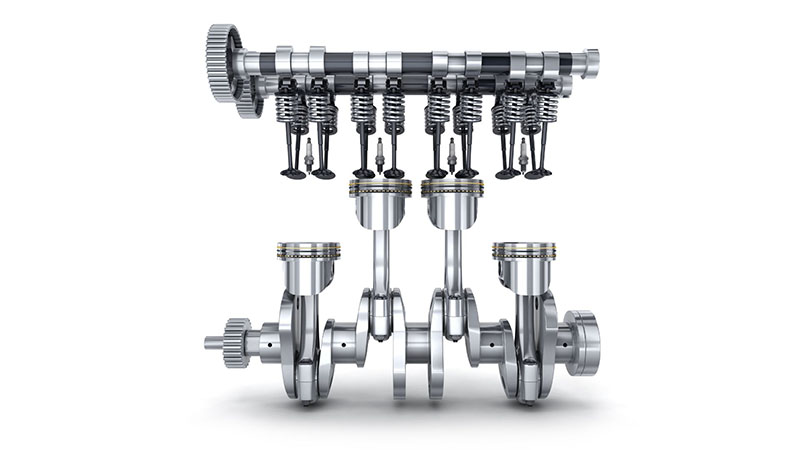Diagram showing crankshaft, camshaft, and piston components in an engine.