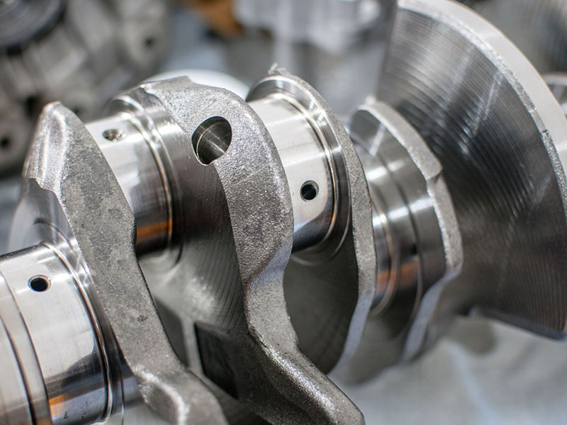 Close-up view of a new automotive crankshaft
