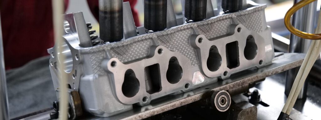 Cylinder head production line, cylinder head assembling with advanced machinery at Nanjing Woda Auto Technology Co., Ltd.