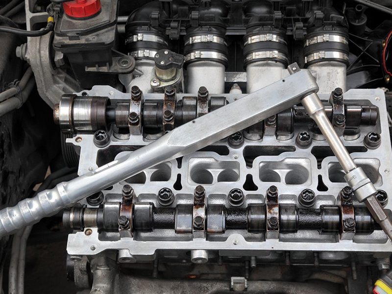 Close-up view of a cylinder head showing intricate engine component details.
