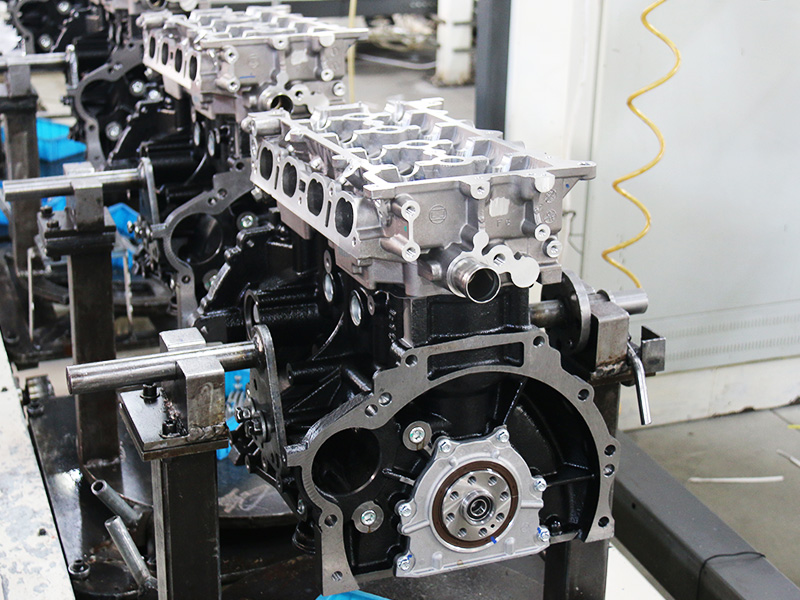 Auto engine assembly line at a direct engine supplier manufacturing facility.