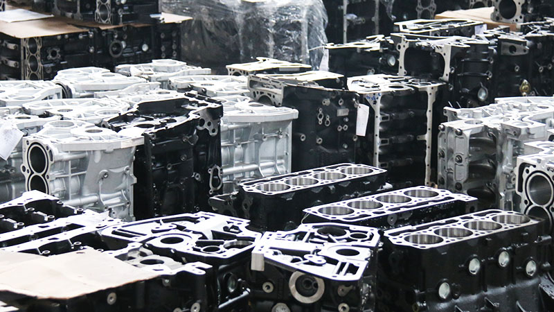 Bulk auto engines stocked in warehouse inventory.