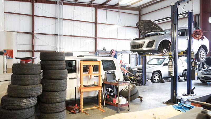 Auto repair garage servicing engine replacement and maintenance.