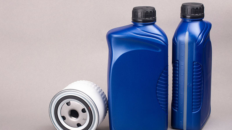 Engine oil and filter set used for car maintenance and oil change.